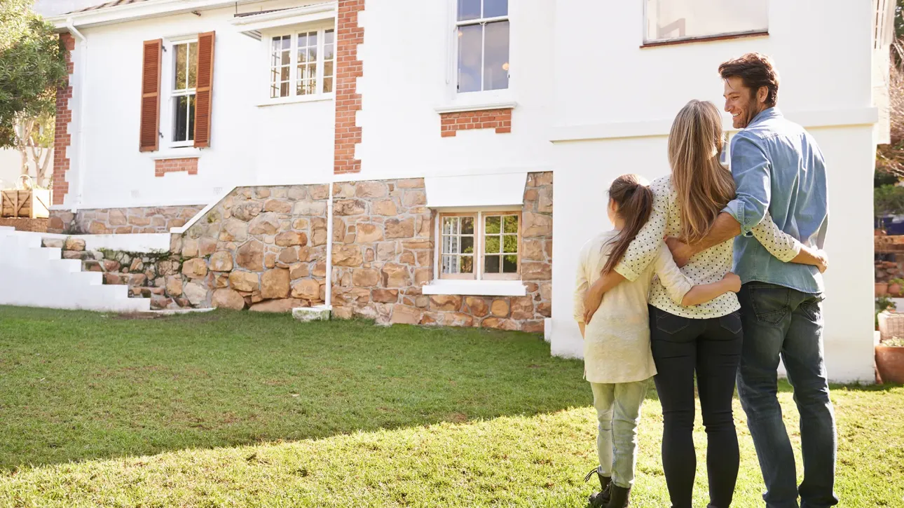 Homeowner planning pre-listing repair timeline with calendar and home inspection checklist.