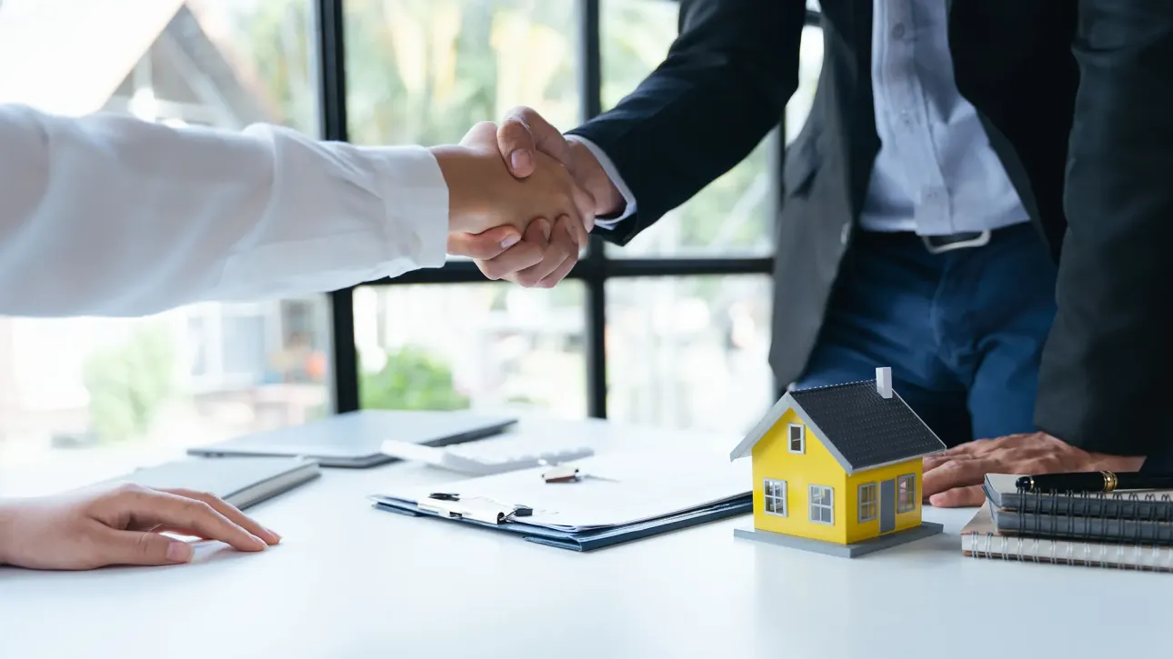 Organized home documentation folder with warranties and repair receipts for closing