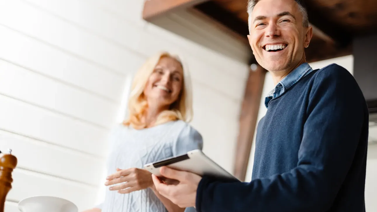 Seller reviewing pre-closing repair receipts and warranties with professional contractor