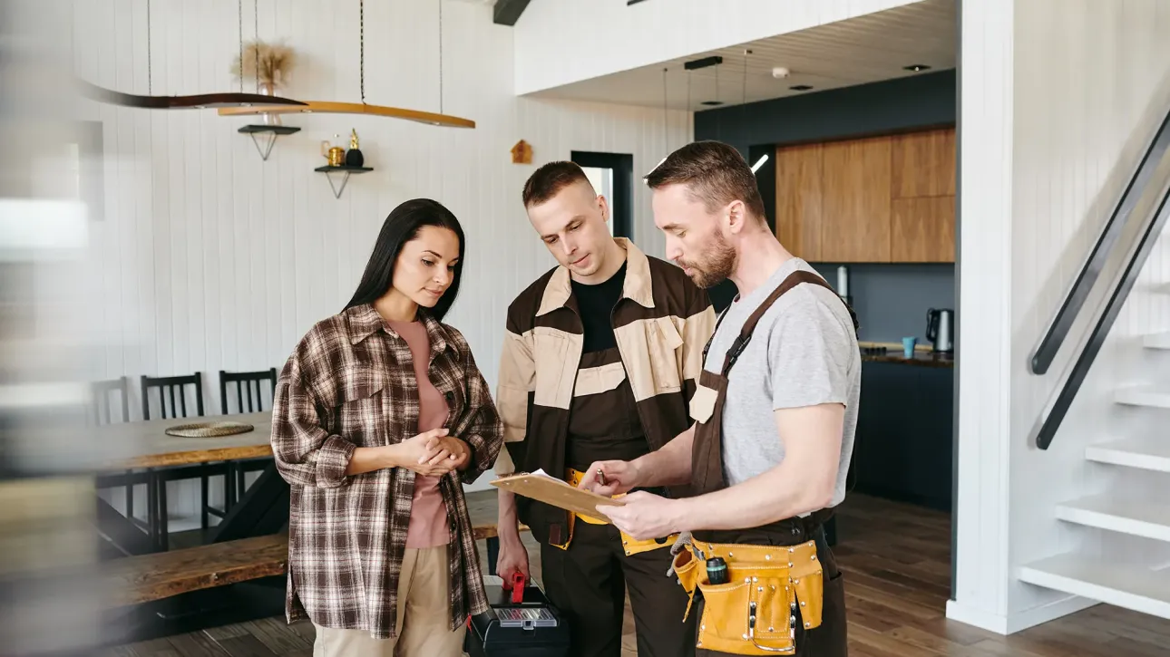 Real estate agent presenting post-inspection repair plan with contractor estimates before Texas closing