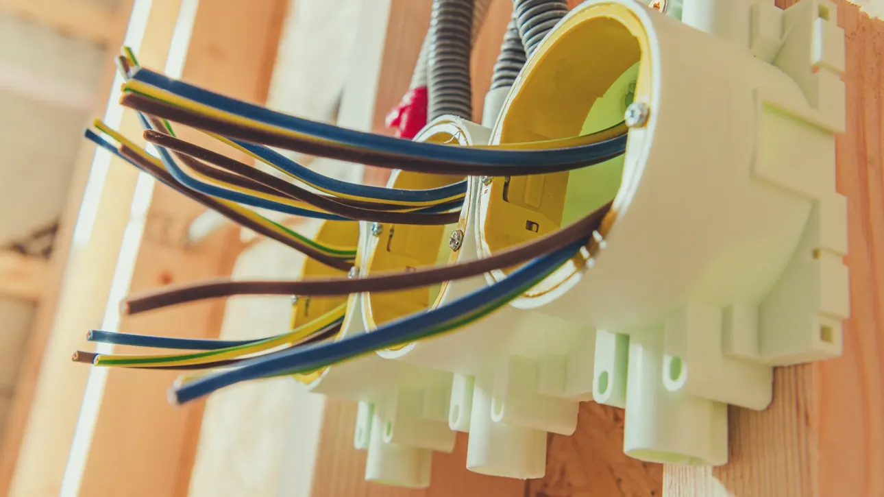 Licensed electrician addressing electrical panel inspection repair at North Richland Hills TX home before closing