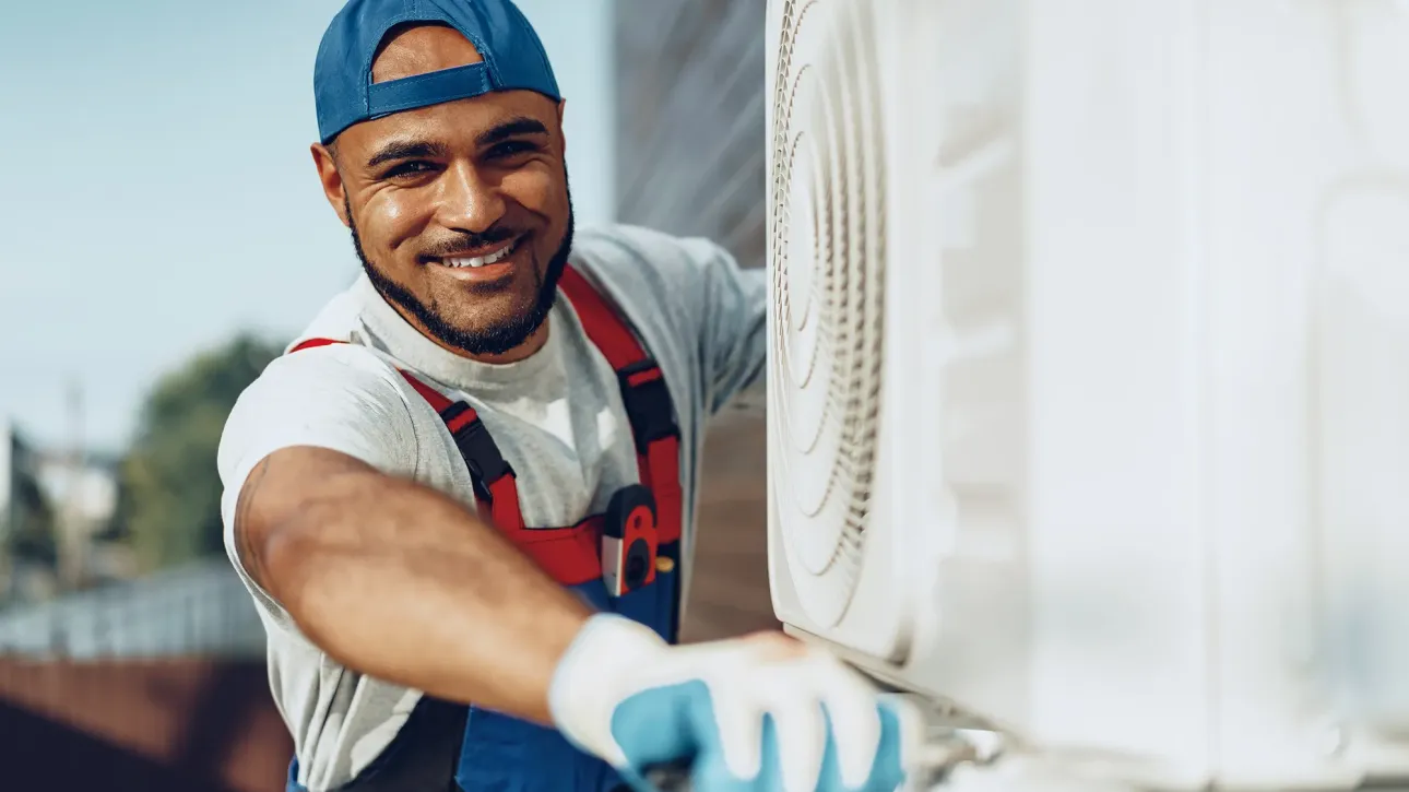Homeowner replacing HVAC filter to resolve post-inspection finding before Texas home closing